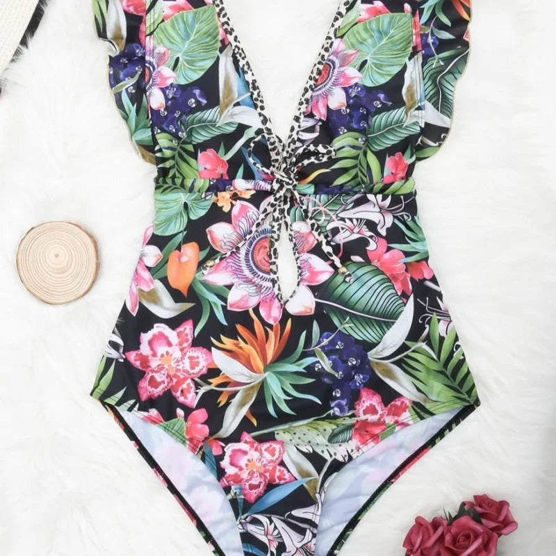 Maillot de bain une pièce décolleté plongeant et volants